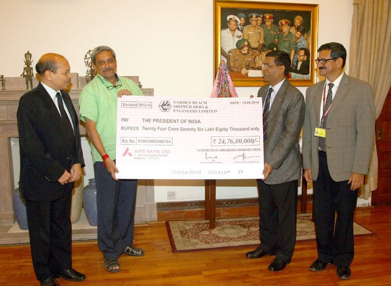 The Union Minister for Defence, Shri Manohar Parrikar receiving a dividend cheque of..