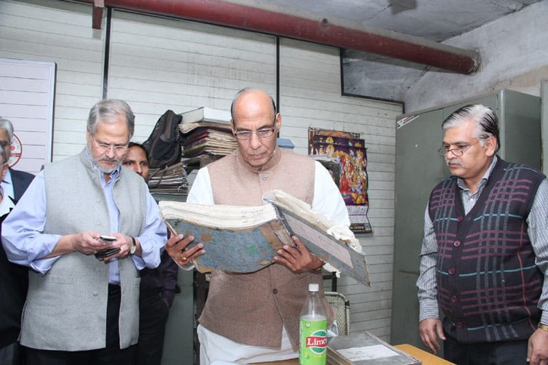The Union Home Minister, Shri Rajnath Singh checking the records, during his …