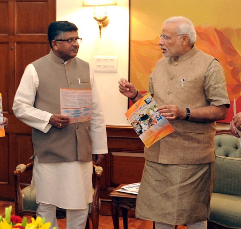 The Prime Minister, Shri Narendra Modi with the Union Minister for Communications …