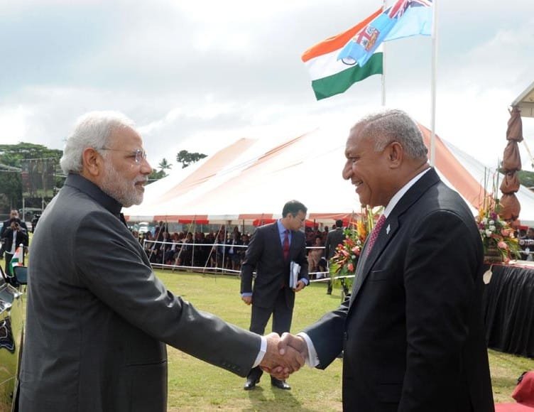 The Prime Minister, Shri Narendra Modi being welcomed by the Prime Minister of Fiji,..