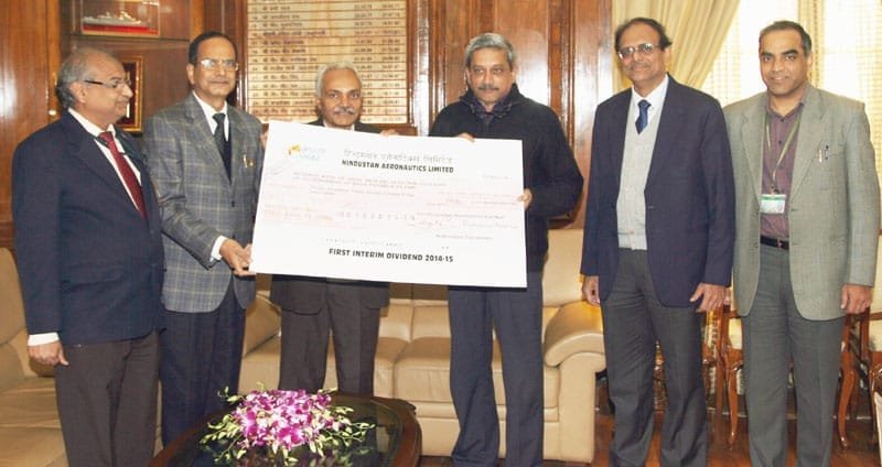 The Chairman of Hindustan Aeronautics Ltd., Shri R.K. Tyagi presenting the first ..