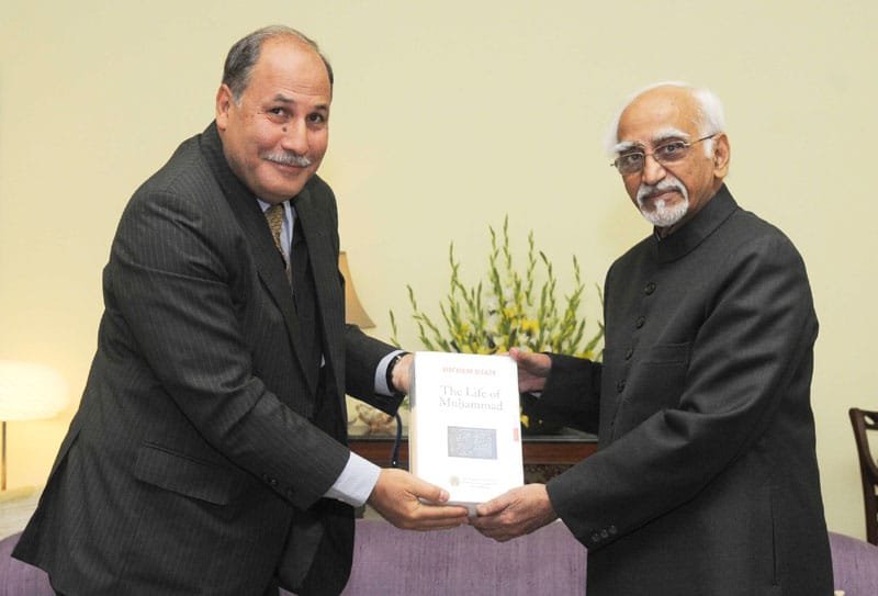 The Vice President, Shri Mohd. Hamid Ansari being presented a book titled ...