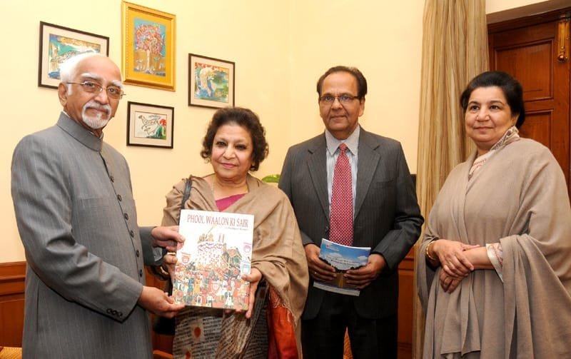The Vice President, Shri Mohd. Hamid Ansari being Presented a Coffee Table Book on ..
