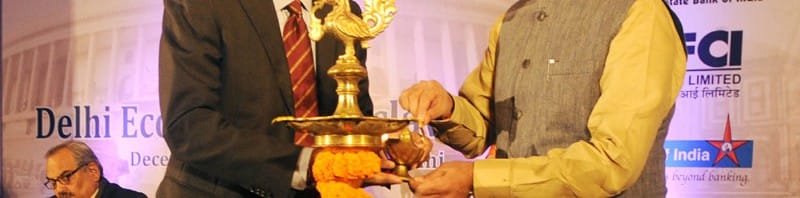 The Minister of State for Finance, Shri Jayant Sinha lighting the lamp to inaugurate...