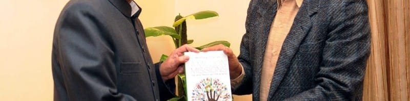 The Vice President, Shri Mohd. Hamid Ansari being presented a book entitled..