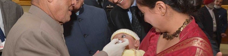 The President, Shri Pranab Mukherjee administering the Polio Drops to a child at..