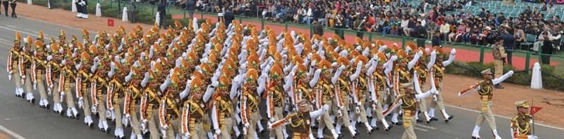 The Border Security Force marching contingent passes through the Rajpath during the full dress rehearsal for the Republic Day Parade-2015, in New Delhi