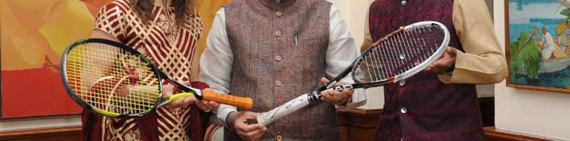 The Tennis Players, Martina Hingis and Leander Paes presenting autographed racquets..