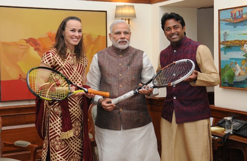 The Tennis Players, Martina Hingis and Leander Paes presenting autographed racquets..