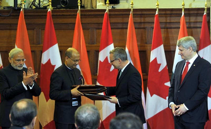 The Prime Minister, Shri Narendra Modi and the Prime Minister of Canada, ..