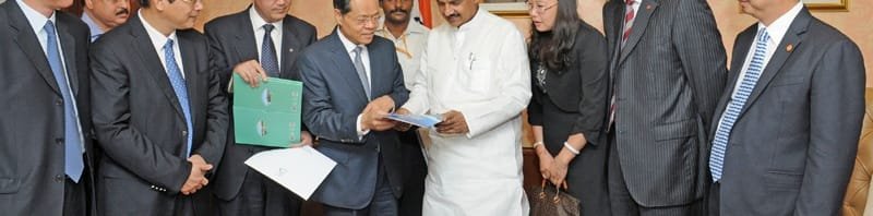 The HM (MOT) and Governor of Guangxi, Peoples Republic of China, Mr. Chen Wu presenting ..