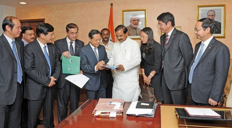 The HM (MOT) and Governor of Guangxi, Peoples Republic of China, Mr. Chen Wu presenting ..