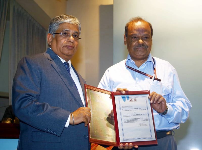 The Director General of BIS, Shri M.J. Joseph is presenting a ISO: 9001 certificate to..