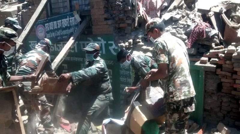 The Indian and Nepalese troops from human chain for clearance of rubble, at Bakthapur