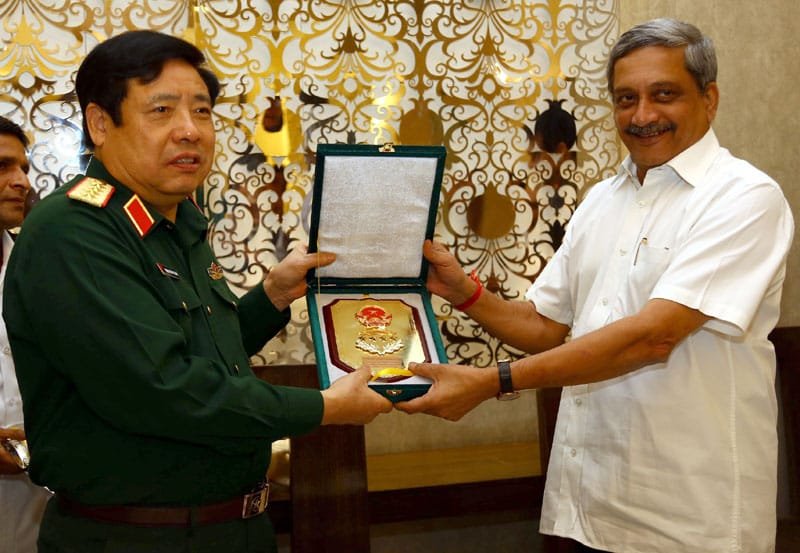 The Minister of National Defence of Vietnam, General Phung Quang Thanh presenting a..