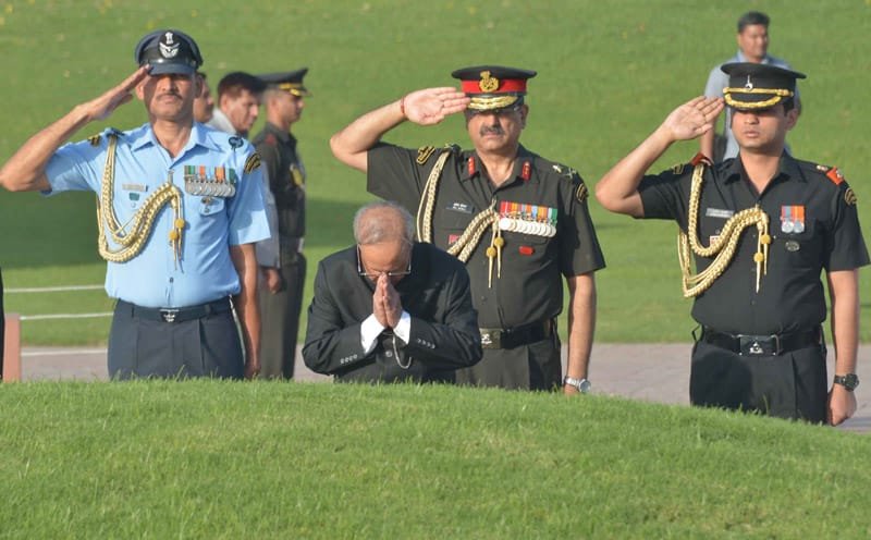 The President, Shri Pranab Mukherjee paying homage at the Samadhi of the..