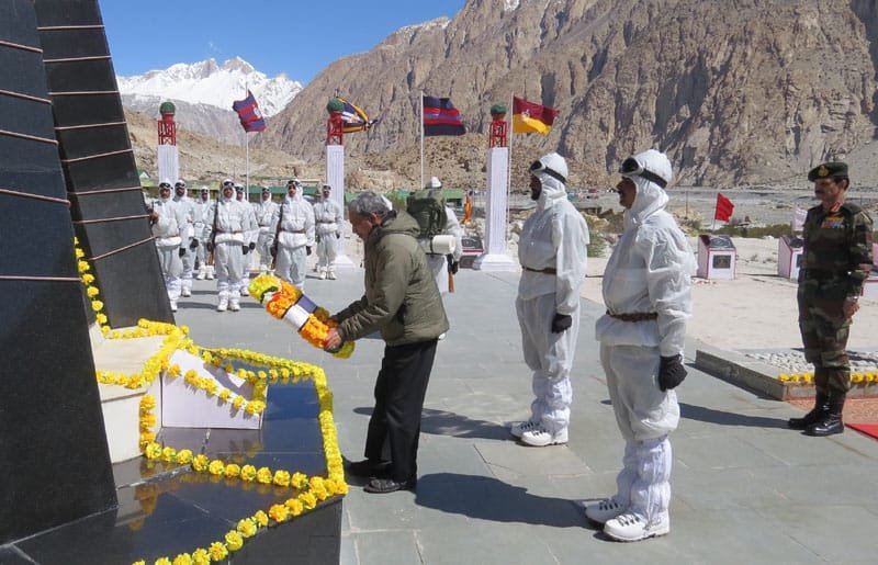 The Union Minister for Defence, Shri Manohar Parrikar laying wreath at Siachen War Memorial,..