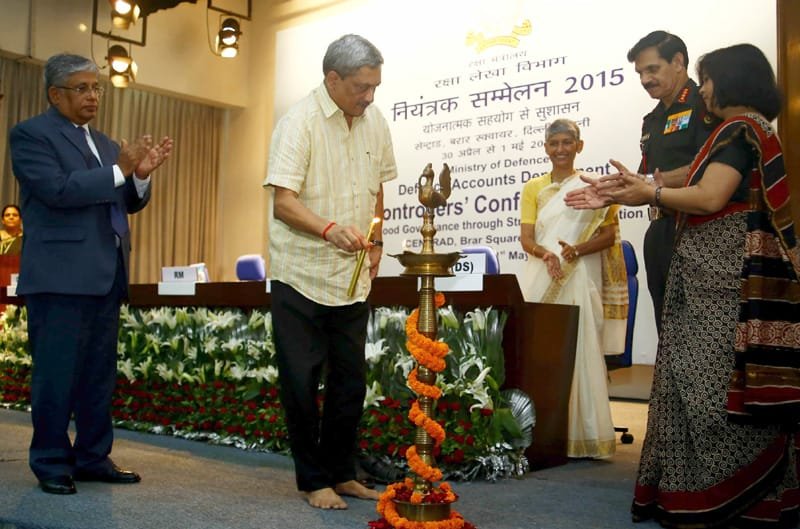 The Union Minister for Defence, Shri Manohar Parrikar lighting the lamp at..