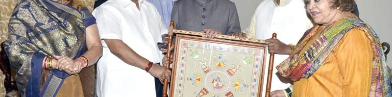 The Vice President, Shri Mohd. Hamid Ansari being presented a memento “’Chamba Rumaal” ..
