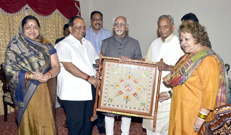 The Vice President, Shri Mohd. Hamid Ansari being presented a memento “’Chamba Rumaal” ..