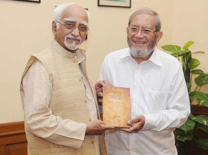The Vice President, Shri Mohd. Hamid Ansari being presented a book entitled..