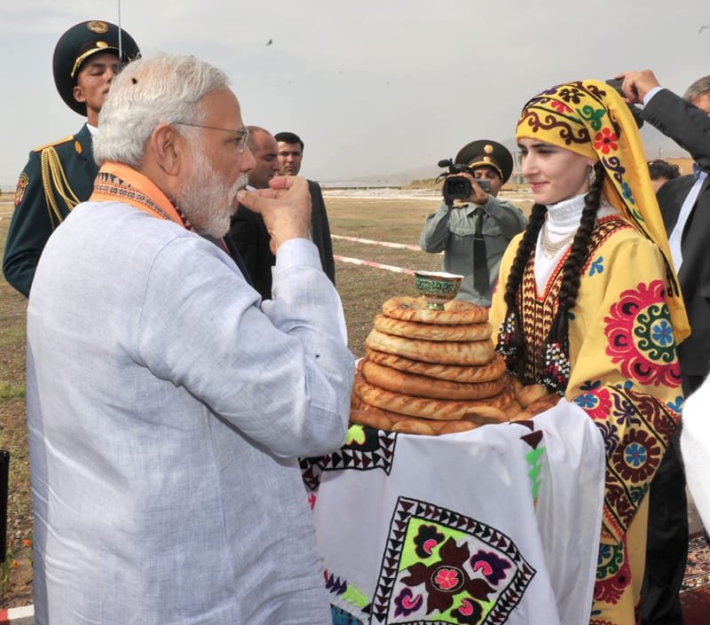 The Prime Minister, Shri Narendra Modi being welcomed on his arrival at the..