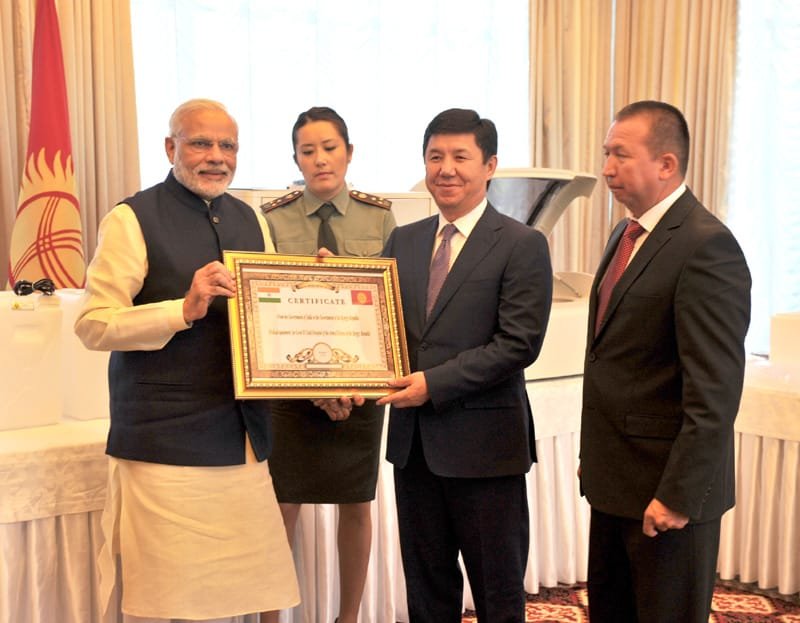 The Prime Minister, Shri Narendra Modi handing over the Certificate of gifts of …