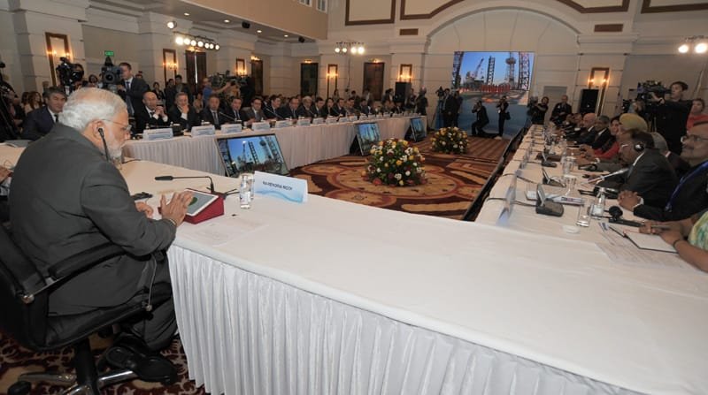 The Prime Minister, Shri Narendra Modi in the round-table interaction with the …