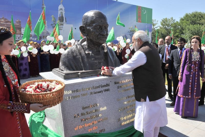The Prime Minister, Shri Narendra Modi paying floral tributes at the bust of the Mahatma Gandhi,…
