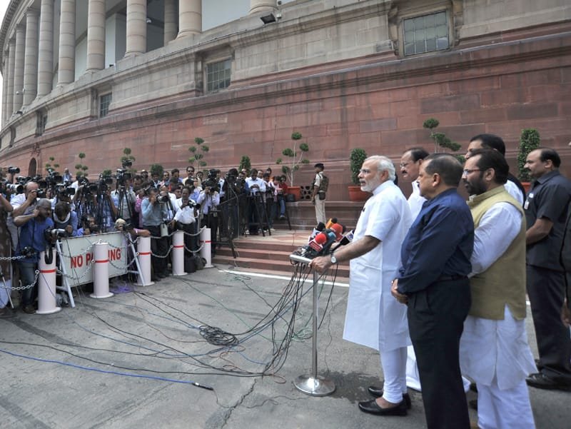 The Prime Minister, Shri Narendra Modi interacting with the media at the start of Monsoon Session of Parliament, in New Delhi