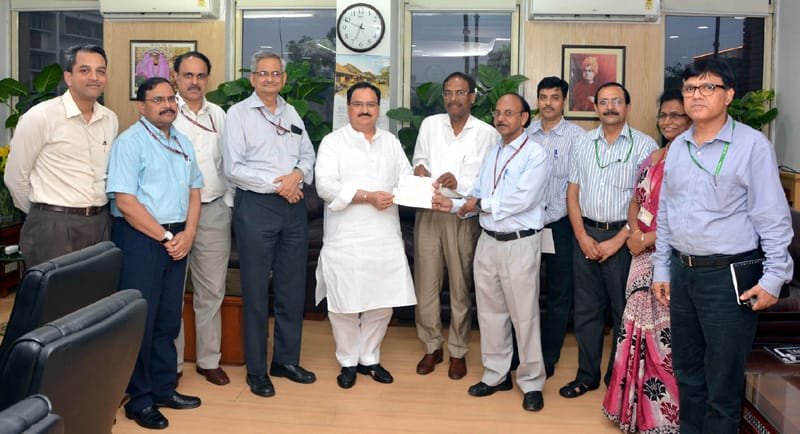 The Union Minister for Health & Family Welfare, Shri J.P. Nadda receiving a cheque of ..