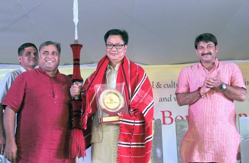 The Minister of State for Home Affairs, Shri Kiren Rijiju being presented a memento at..