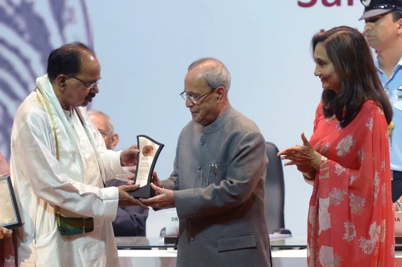 The President, Shri Pranab Mukherjee presenting the 24th Saraswati Samman 2014 ..