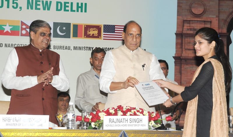 The Union Home Minister, Shri Rajnath Singh distributing the certificate to a ..