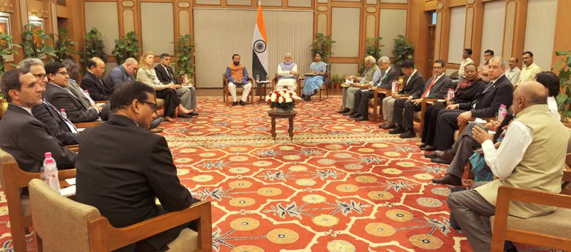 The Prime Minister, Shri Narendra Modi meeting the Heads of Delegations of..