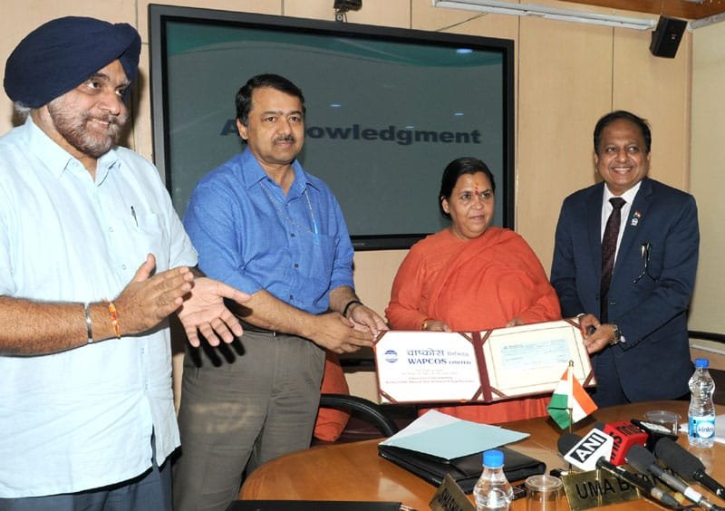 The CMD, WAPCOS Limited, Shri R.K. Gupta presenting a dividend cheque to the ..
