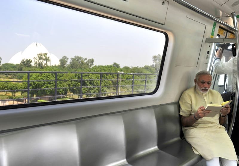 The Prime Minister, Shri Narendra Modi travelling by the Delhi Metro to the ..