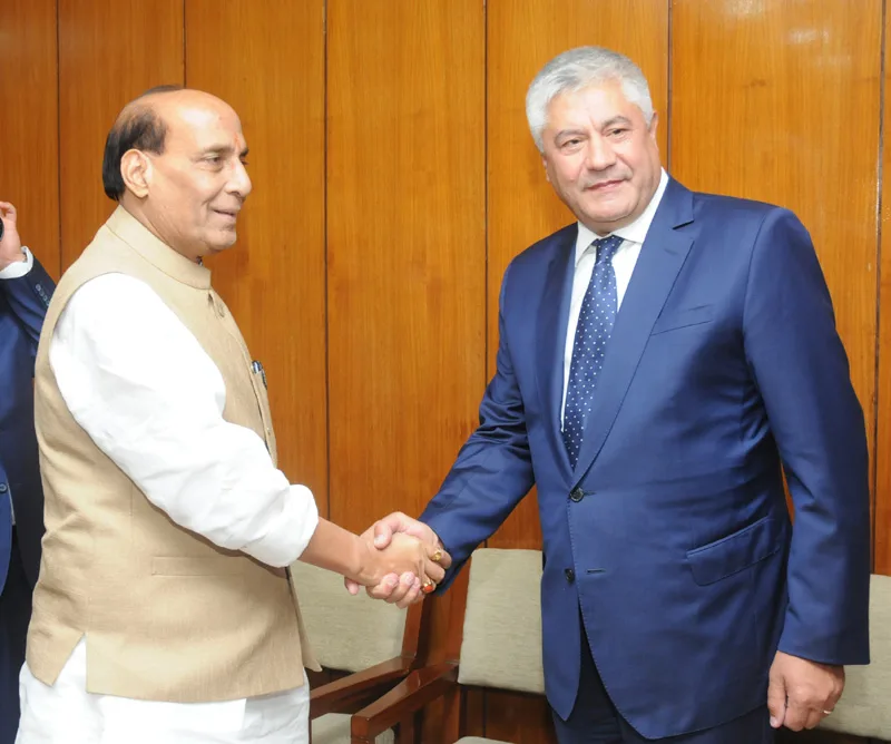 The Union Home Minister, Shri Rajnath Singh shaking hands with the Minister of the..