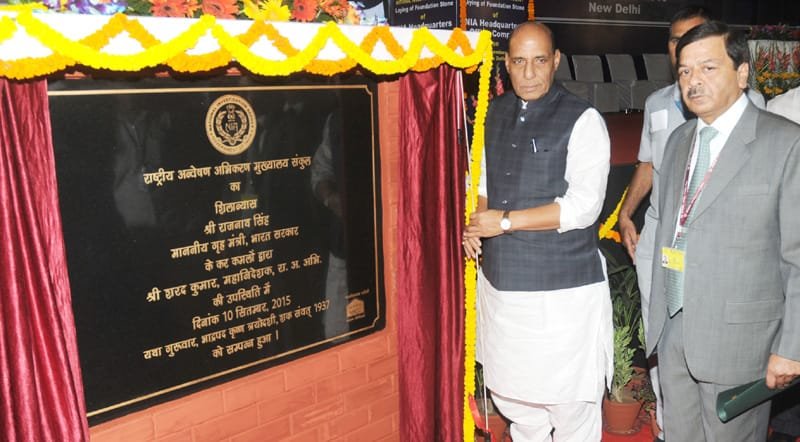 The Union Home Minister, Shri Rajnath Singh unveiling the plaque to the lay foundation stone of..