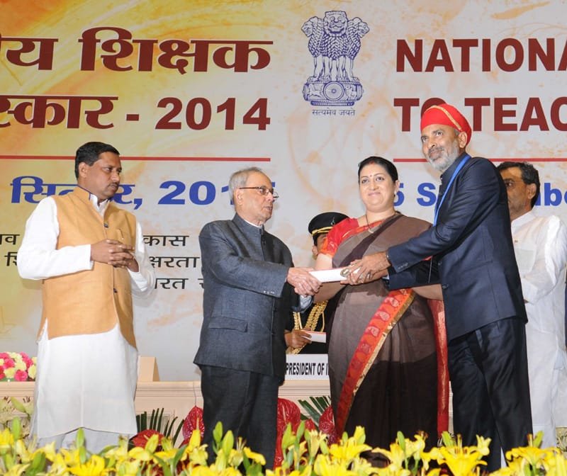 The President, Shri Pranab Mukherjee presenting the National Award for Teachers-2014 to..