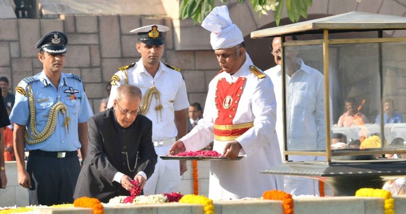 The President, Shri Pranab Mukherjee paying floral tributes at the Samadhi of ..