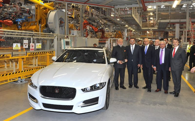 The Prime Minister, Shri Narendra Modi visiting the Jaguar and Land Rover factory,..