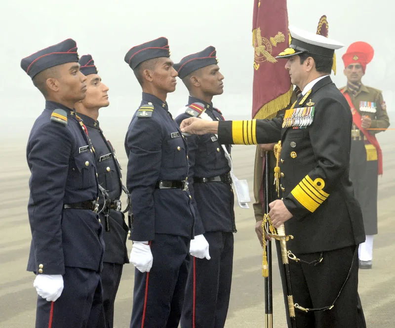 The Chief of Naval Staff, Admiral R.K. Dhowan presenting the medal to the award winners..