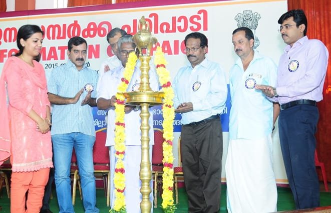 The Nedumangad Municipal Chairman, Shri Chettachal Sahadevan lighting the ..