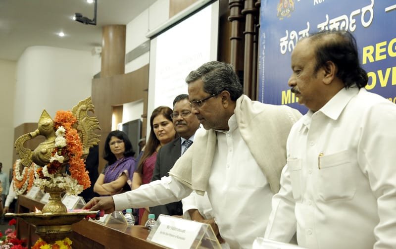 The Chief Minister of Karnataka, Shri K. Siddaramaiah lighting the lamp to inaugurate..