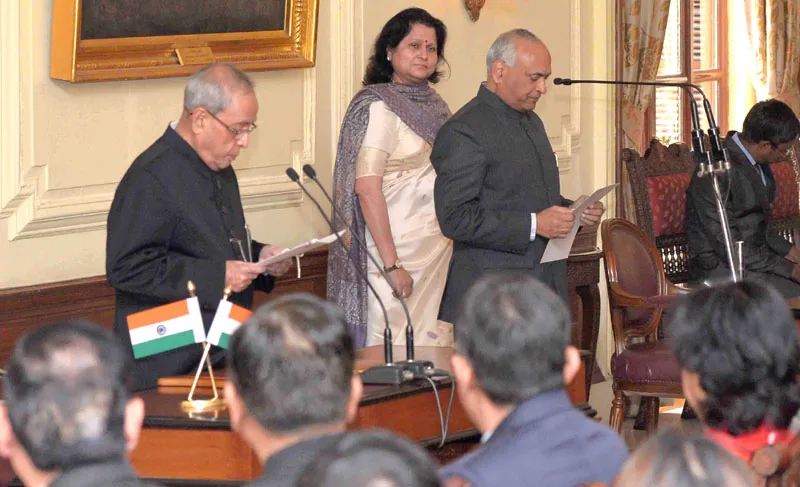 The President, Shri Pranab Mukherjee administering the oath to Shri R.K. Mathur as..