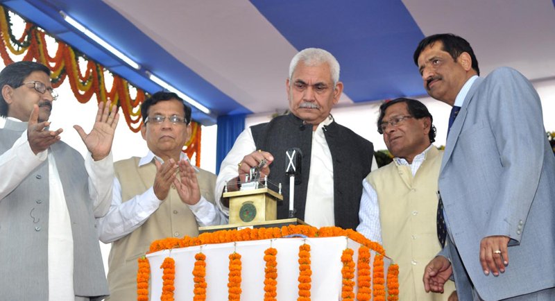 The Minister of State for Railways, Shri Manoj Sinha pressing the Lever marking the..