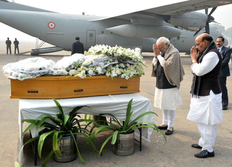 The Prime Minister, Shri Narendra Modi paying homage at the mortal remains of..
