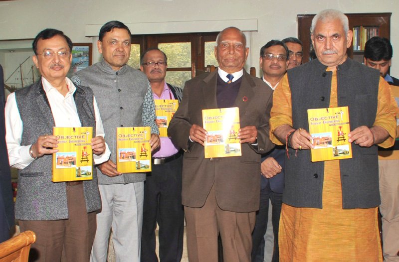 The Minister of State for Railways, Shri Manoj Sinha releasing a book “Objective..