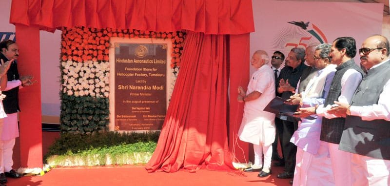 The Prime Minister, Shri Narendra Modi laying the foundation stone for HAL’s Helicopter Factory, ..